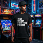 Eat Sleep Buttons Repeat fighting game graphic t-shirt by TJPuma